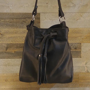 
            
                Load image into Gallery viewer, Drawstring black leather bag with fringe tassels. Beautiful handcrafted leather from Millersburg, Ohio. This  pouch can be ordered in cheetah and different leather colors!
            
        