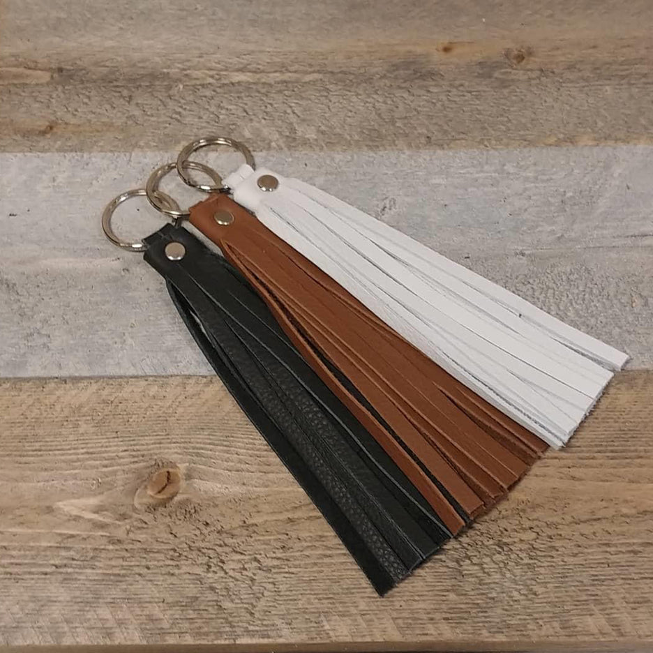 The leather tassel key chains can also clip on to your purse as decoration . Handmade from top grain leather.